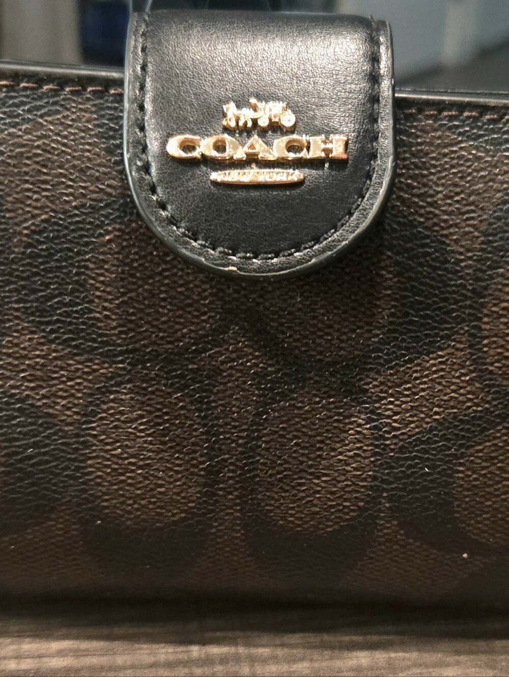 Coach Black Signature Leather Trifold Wallet with Gold Logo. Used Good Condition